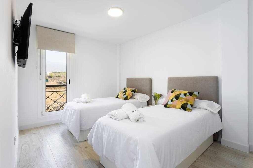 Sunnyland Apartment Arona Cho Extérieur photo